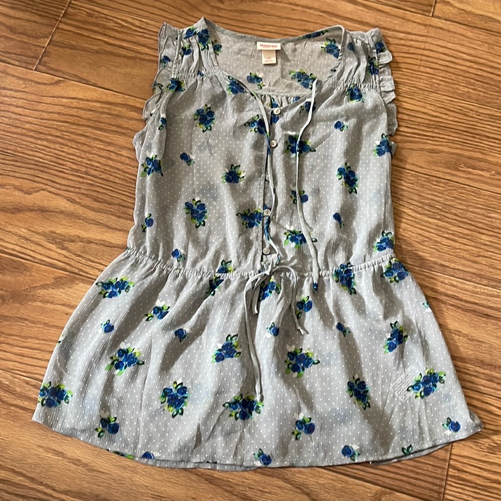 Sheer button up sleeveless blouse